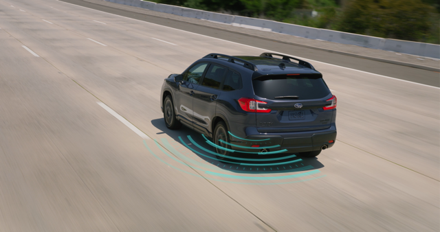 A Subaru projects an arcing line representing the Blind-Spot Detection.
