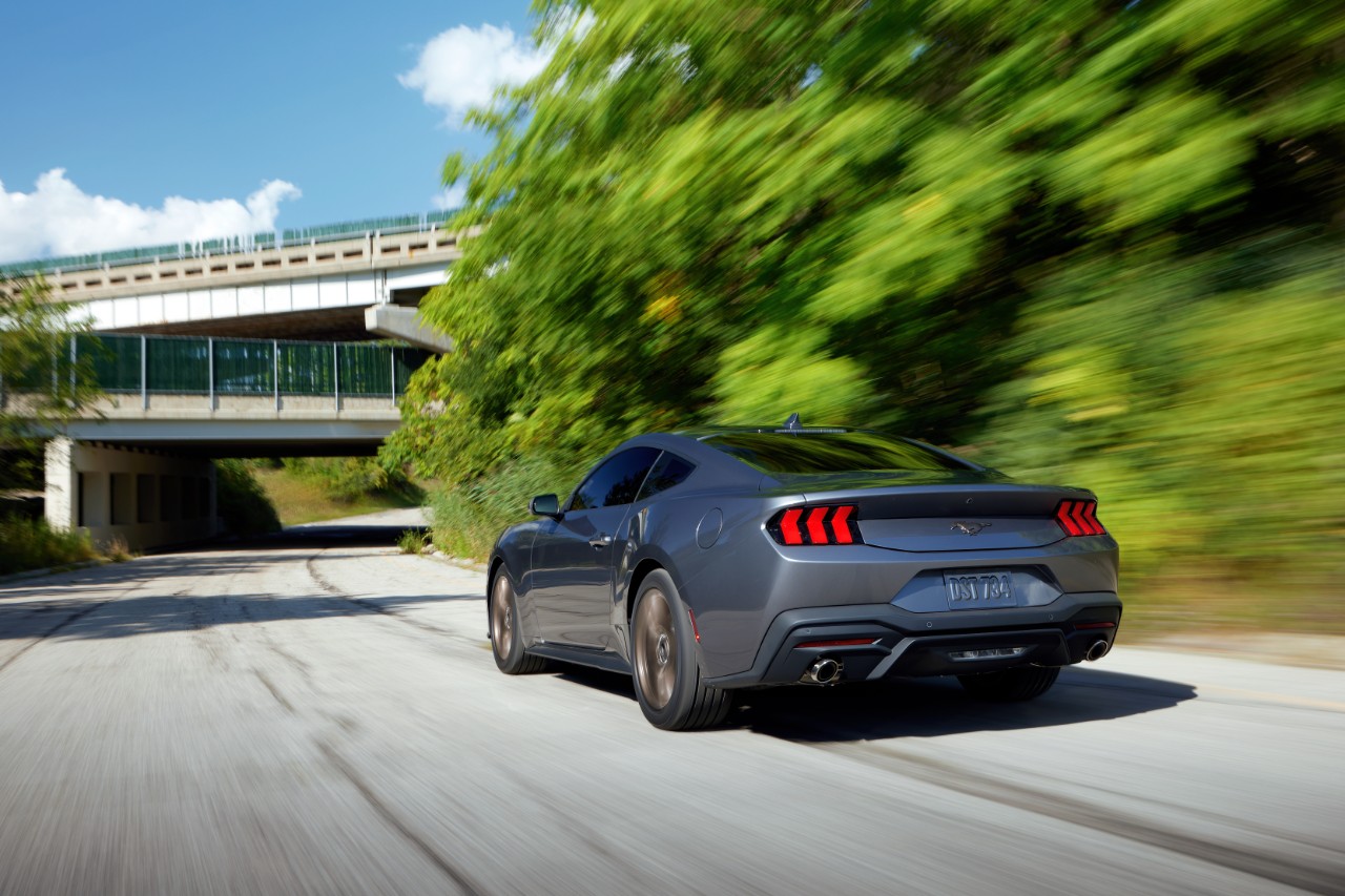 image of grey ford mustang driving