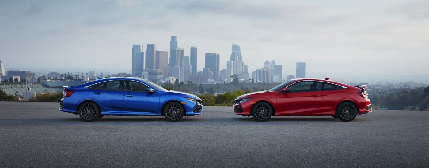 Blue and red 2019 Honda Civic Si overlooking a city