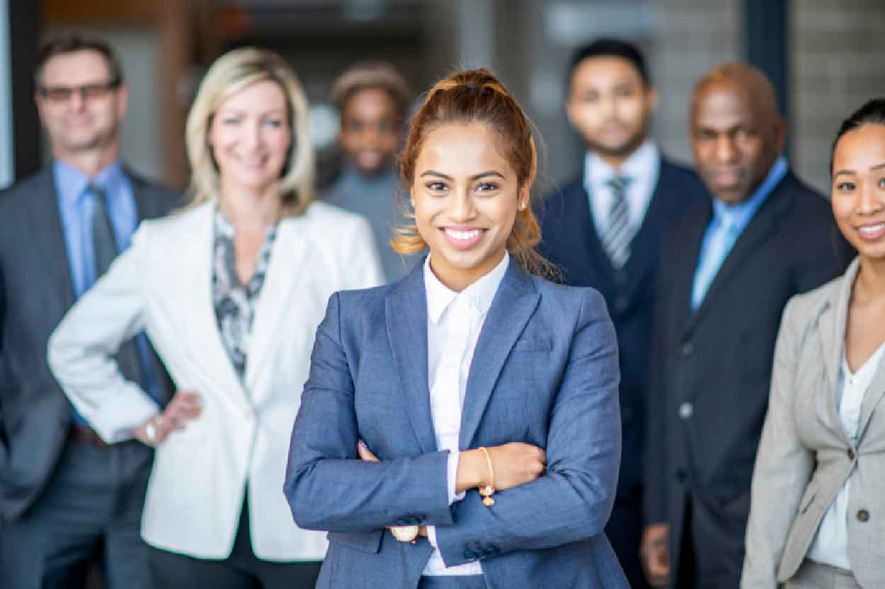 A team of supportive staff at a car dealership ready and waiting to help you with your car purchase