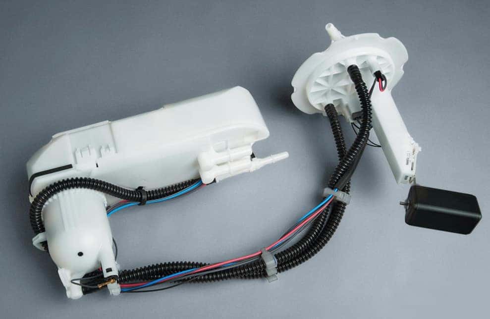 Genuine Nissan fuel pump assembly with its fuel level sender