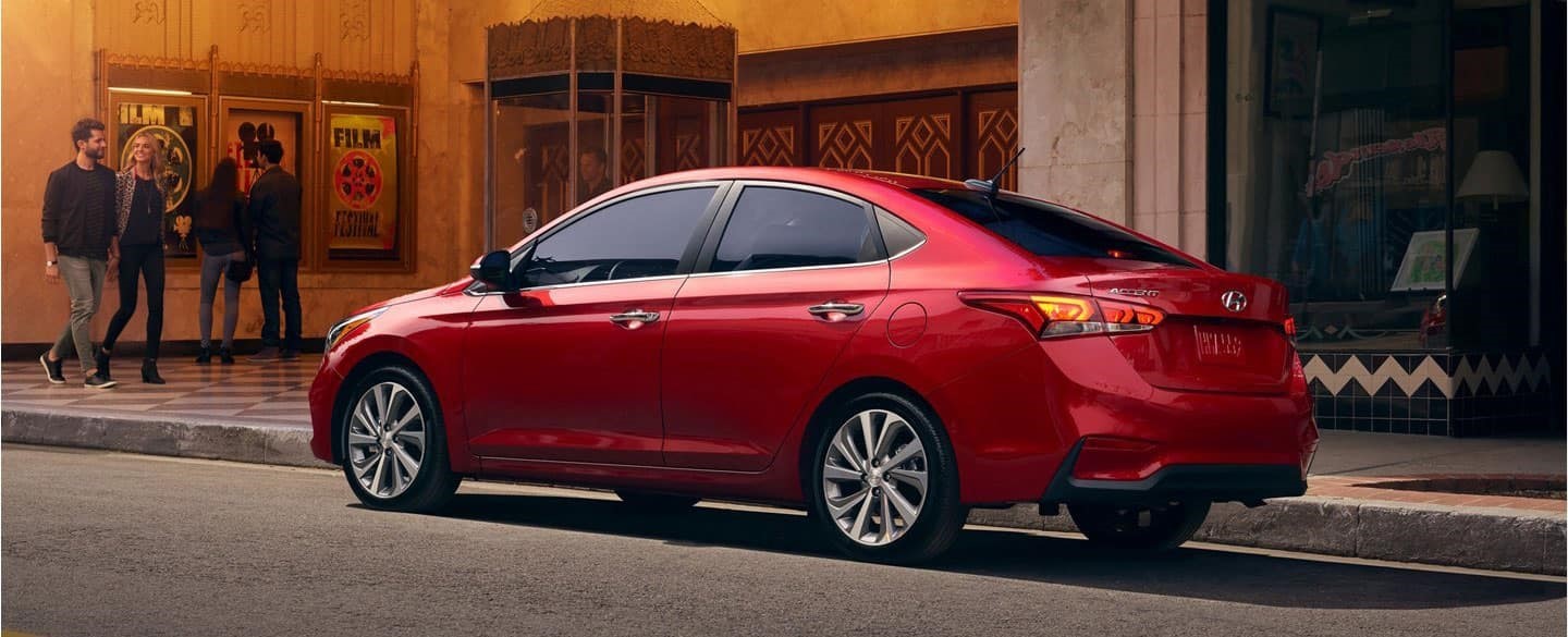 A red  2020 Hyundai Accent parked.