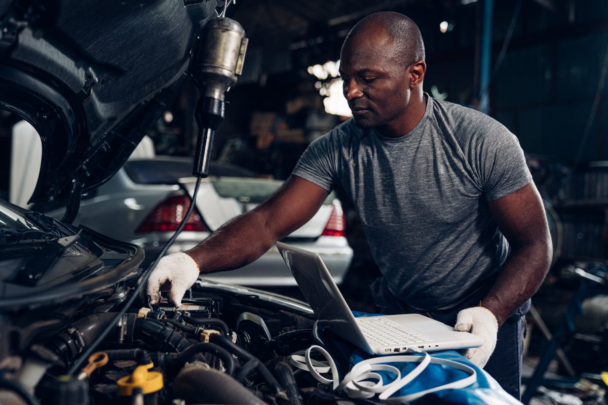 Service Technician Under Hood