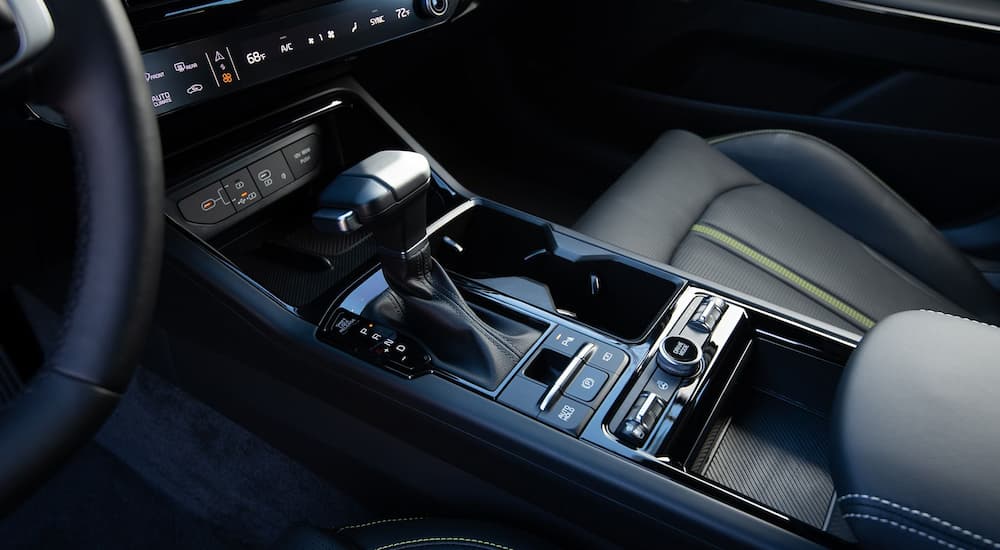 Shifter and dashboard controls inside a 2025 Kia K5
