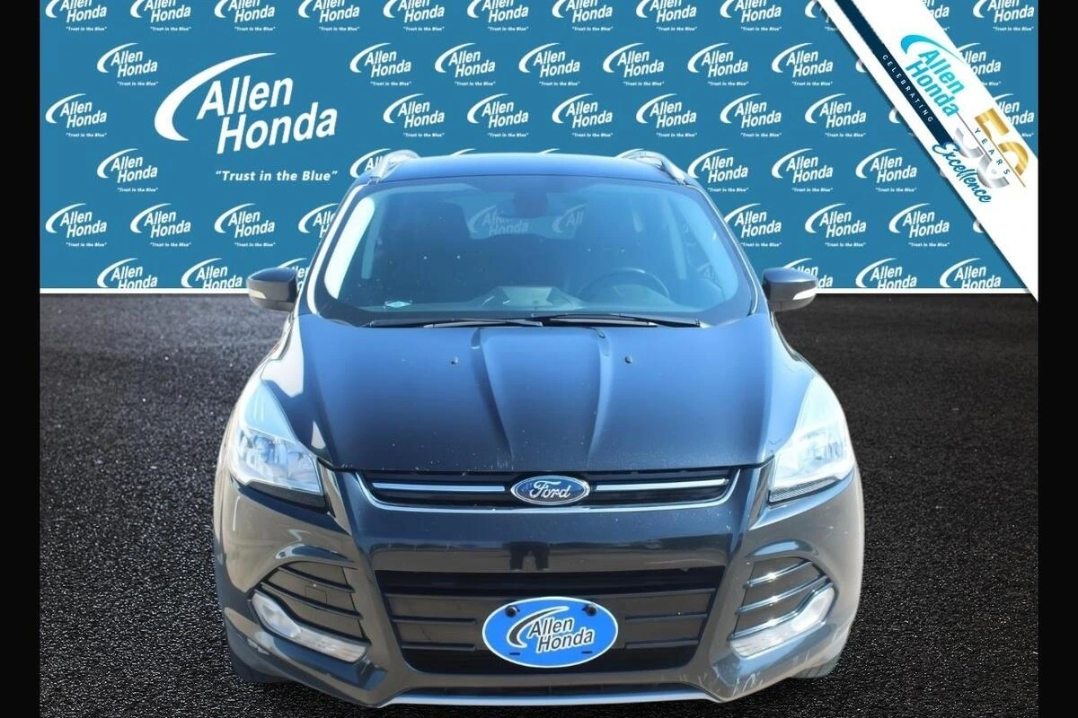 Used 2014 Ford Escape Titanium with VIN 1FMCU0J93EUA54760 for sale in College Station, TX