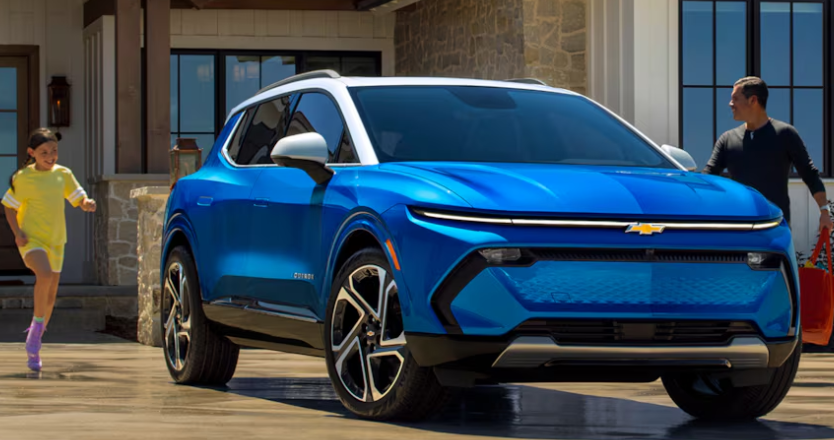 Father and daughter running to enter their 2024 Chevy Equinox EV with blue paint.