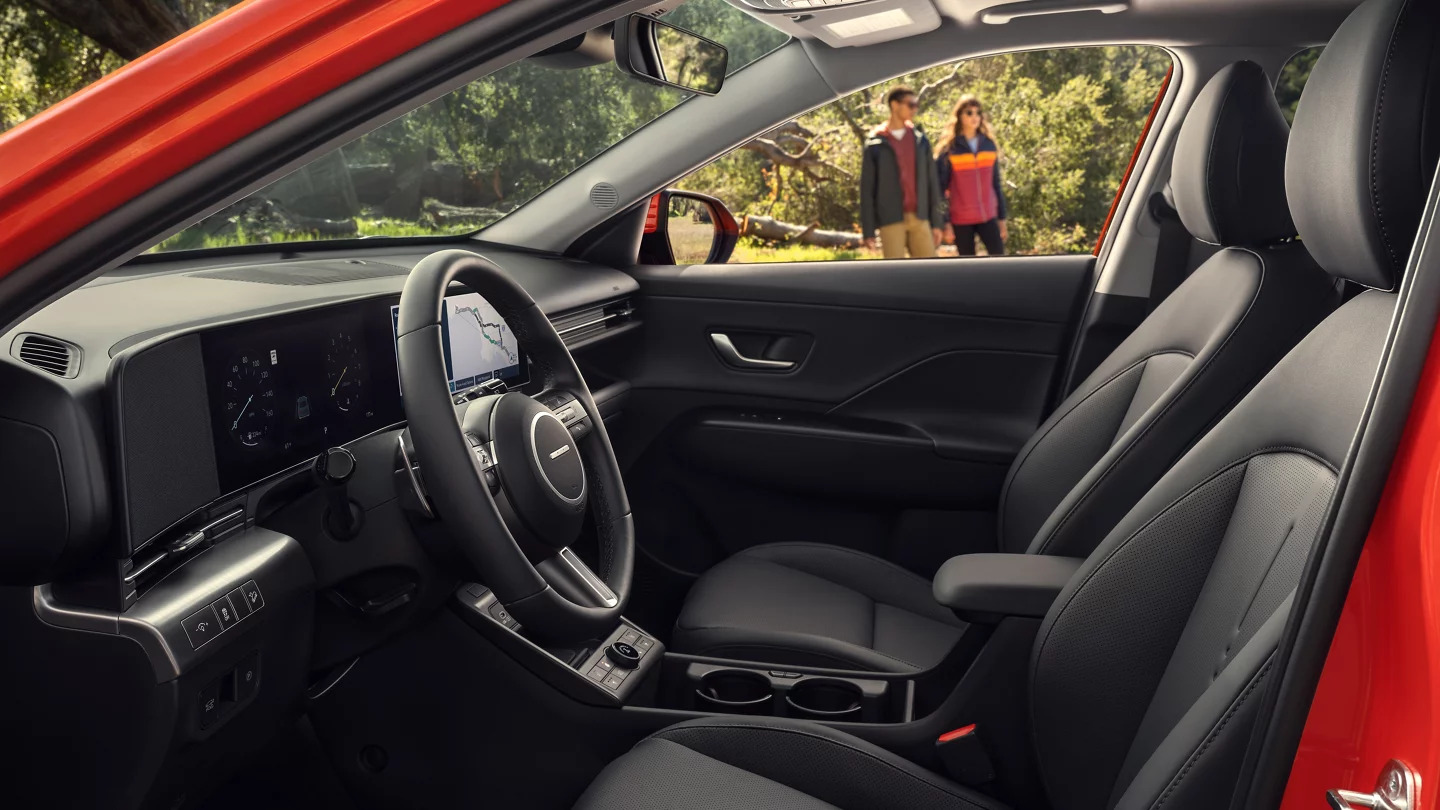 The front interior of the Hyundai Kona.