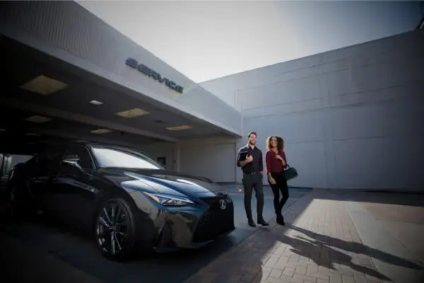 Couple at Lexus dealership
