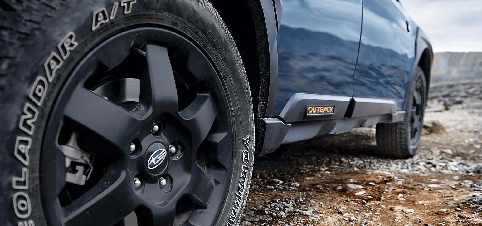 Close-up of a Subaru Wilderness all-terrain tire and wheel