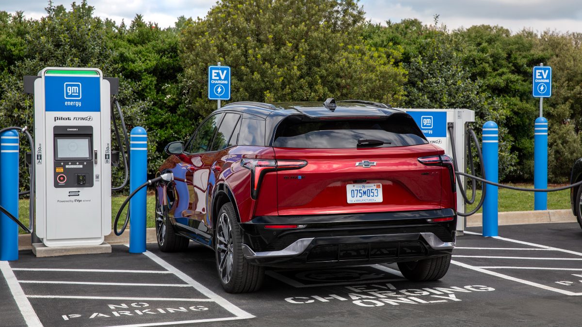2026 Chevrolet Blazer EV Exterior Driver Side Rear Angle while Plugged In at DC Public Fast Charging Station