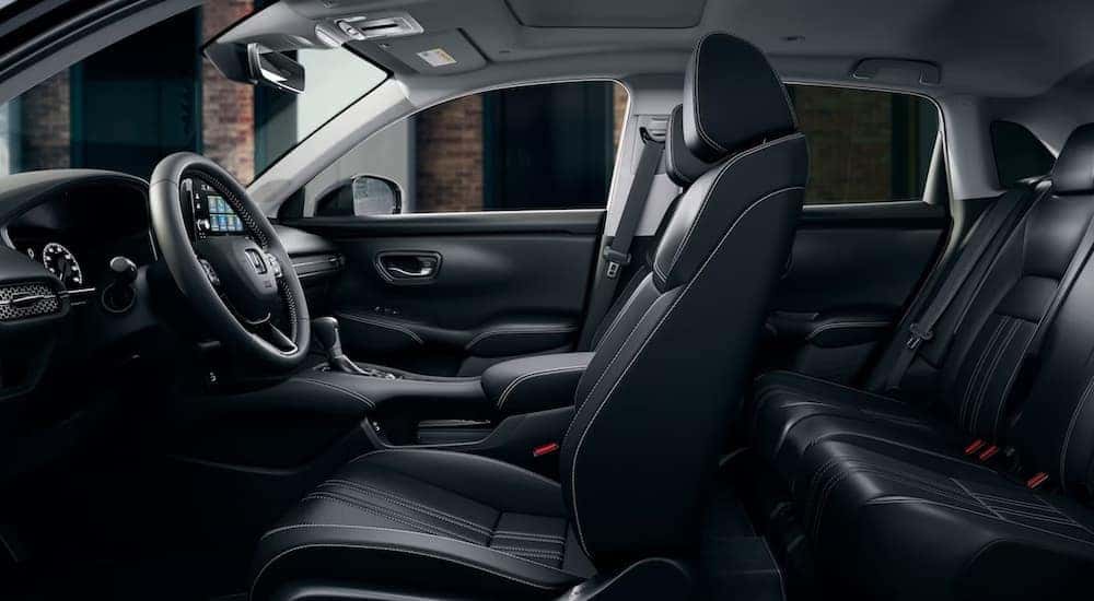 The black interior in a 2025 Honda HR-V is shown.