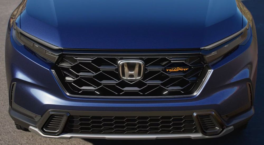 Front grille of a blue 2026 CR-V TrailSport.