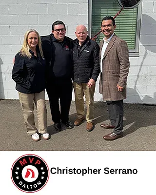 Christopher Serrano with Dalton Subaru team members