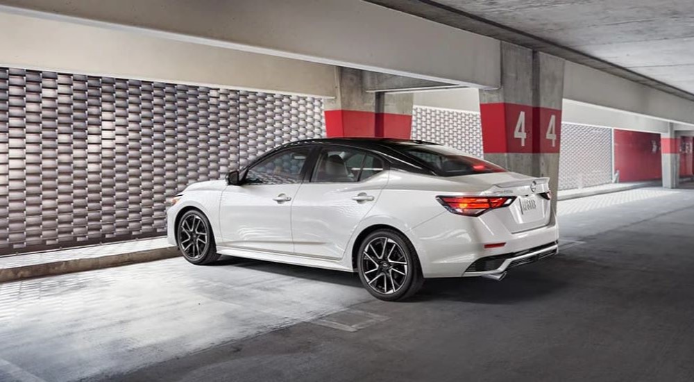 White 2024 Nissan Sentra in a parking garage.