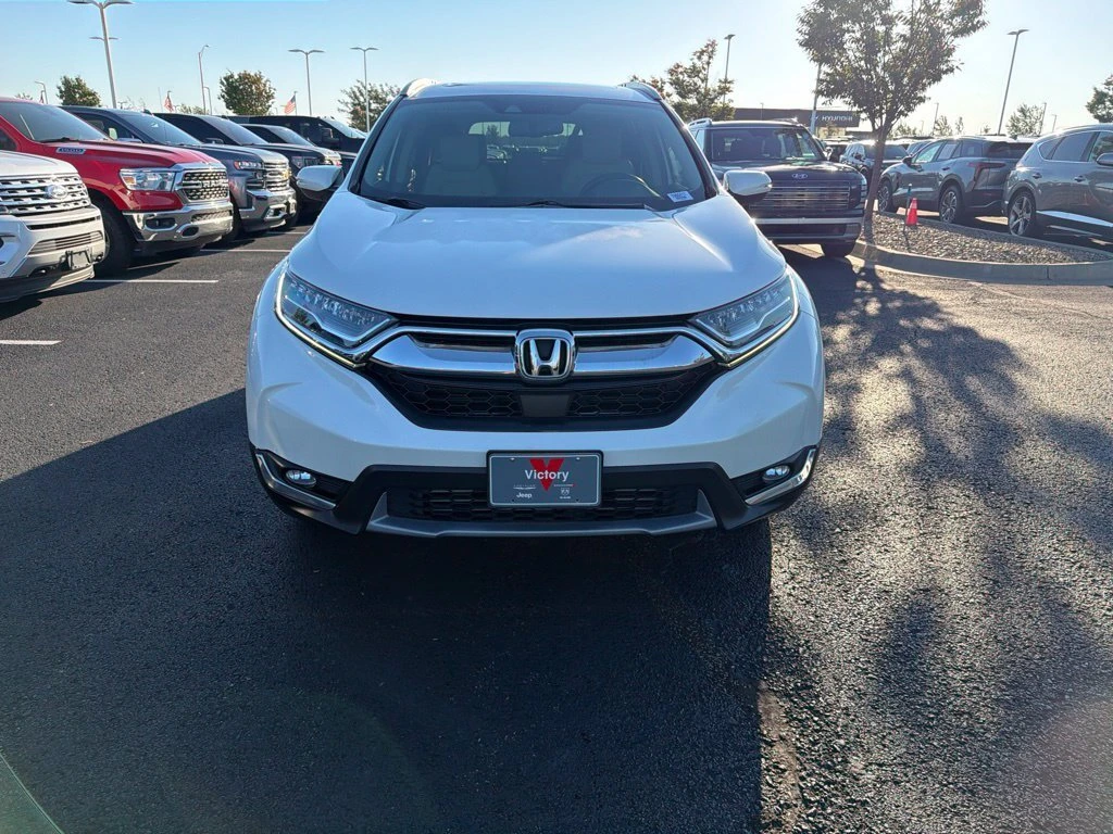 Used 2017 Honda CR-V Touring with VIN 5J6RW1H95HL000417 for sale in Kansas City