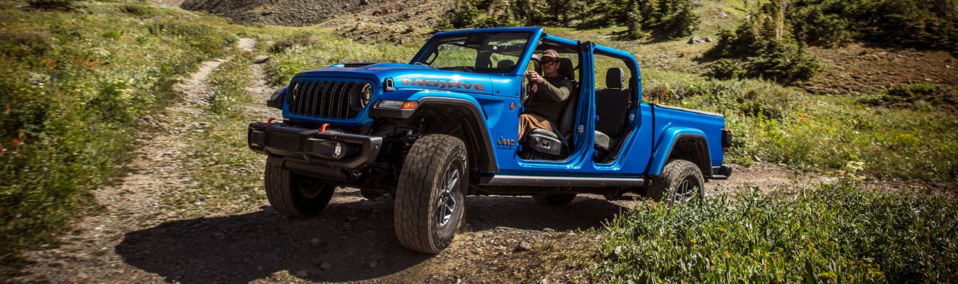 2024 Jeep Gladiator Exterior Driver Side Front Profile while Off-Roading