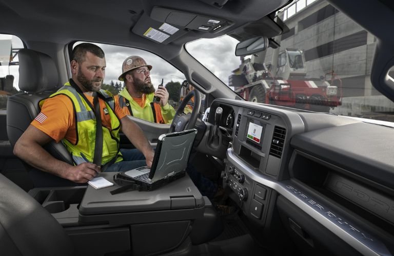 Worker Using Laptop and Wi-Fi Hotspot in 2023 Ford Super Duty