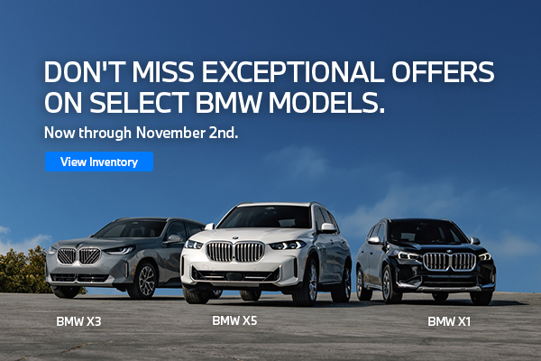 BMW X3, X5, & X1 parked on the street