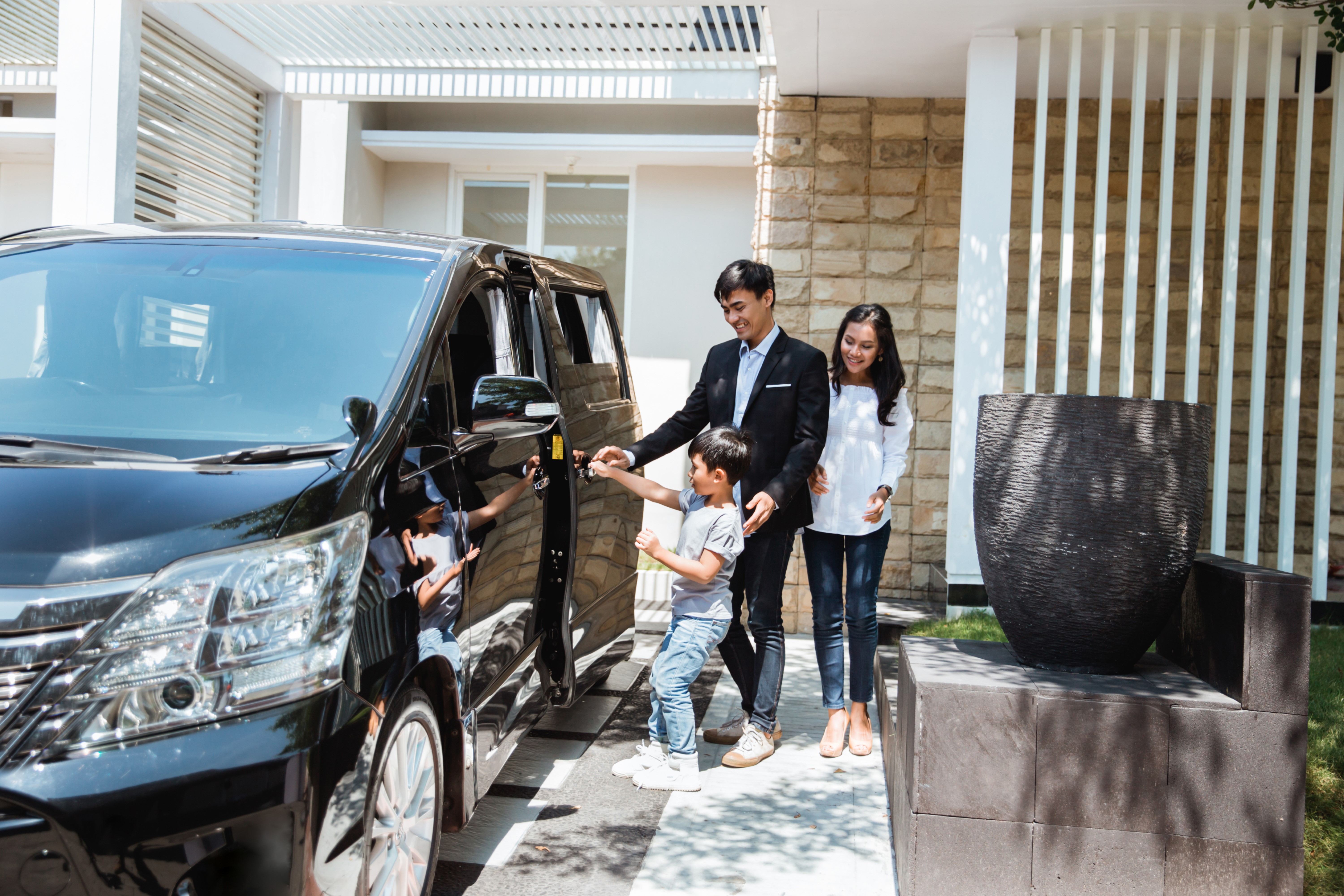 family enters van together