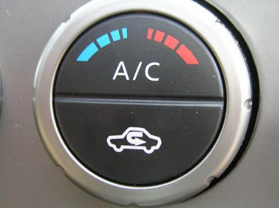Close up of A/C vehicle cooler dial in a Nissan vehicle.