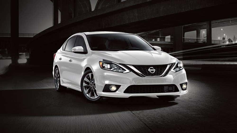 White 2018 Nissan Sentra sedan parked at night