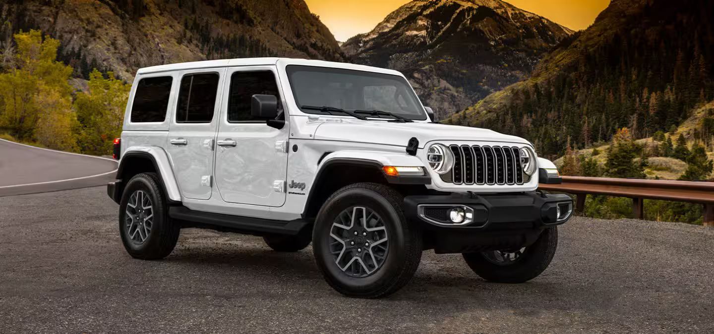 a white jeep sitting parked.