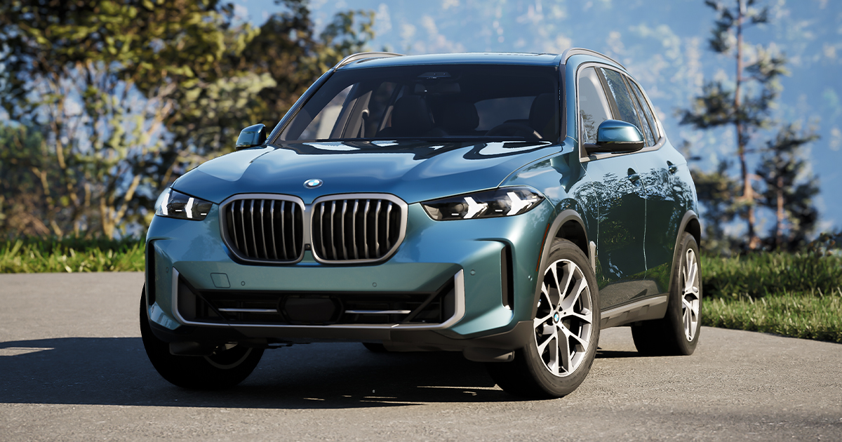 A BMW X5 parked by a field.