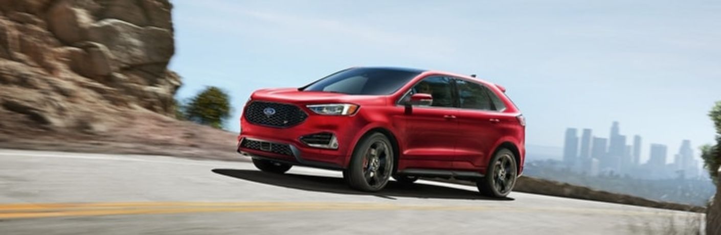 Red 2024 Ford Edge ST on a Country Highway