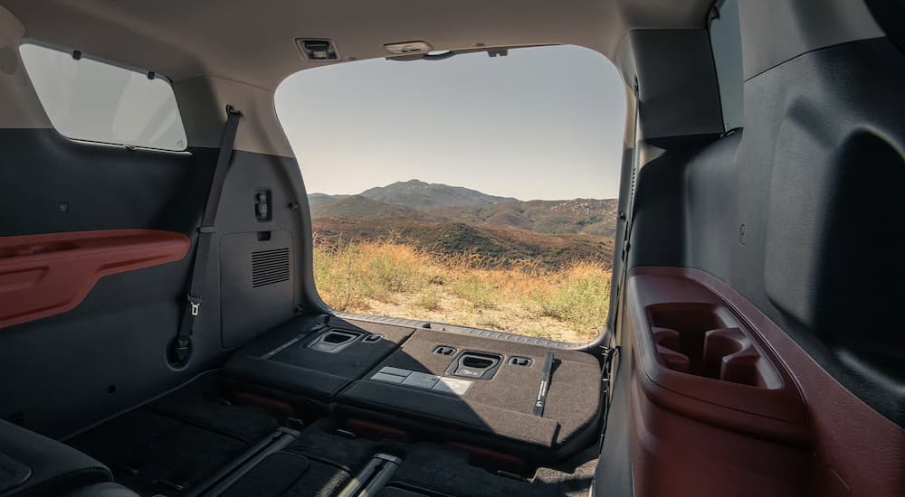 Folded seats in the back of a 2026 Kia Carnival