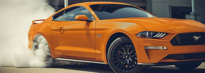 image of orange ford mustang 