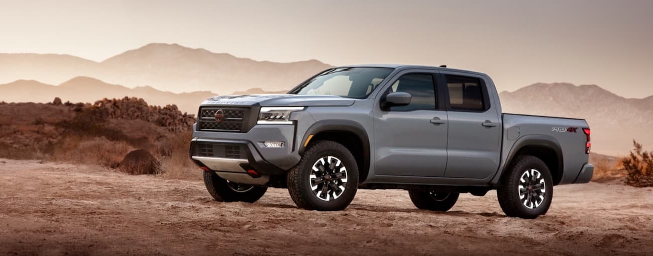 Grey 2022 Nissan Frontier parked off-road