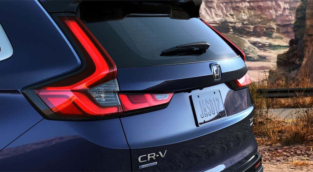 The rear liftgate on a blue 2025 Honda CR-V Touring Sport Hybrid for sale near Henrietta.