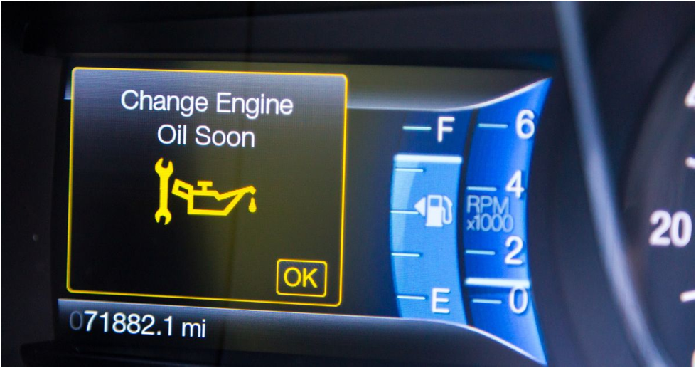Subaru gauge cluster showing the Change Engine Oil Soon warning