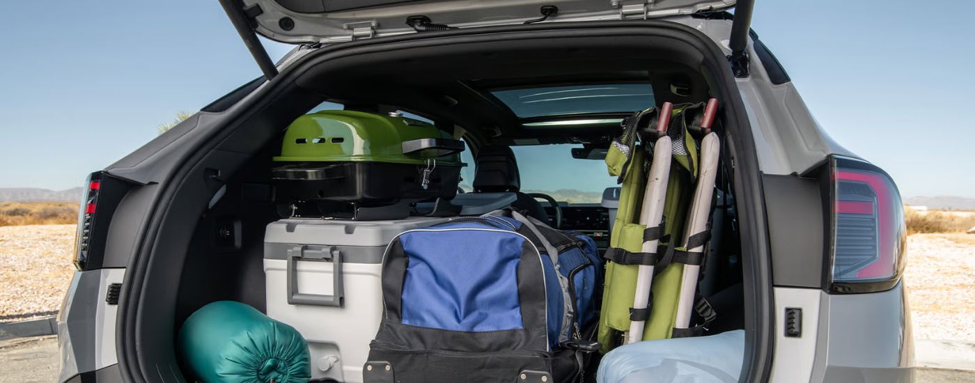 The fully loaded cargo area of a 2026 Kia Sportage.