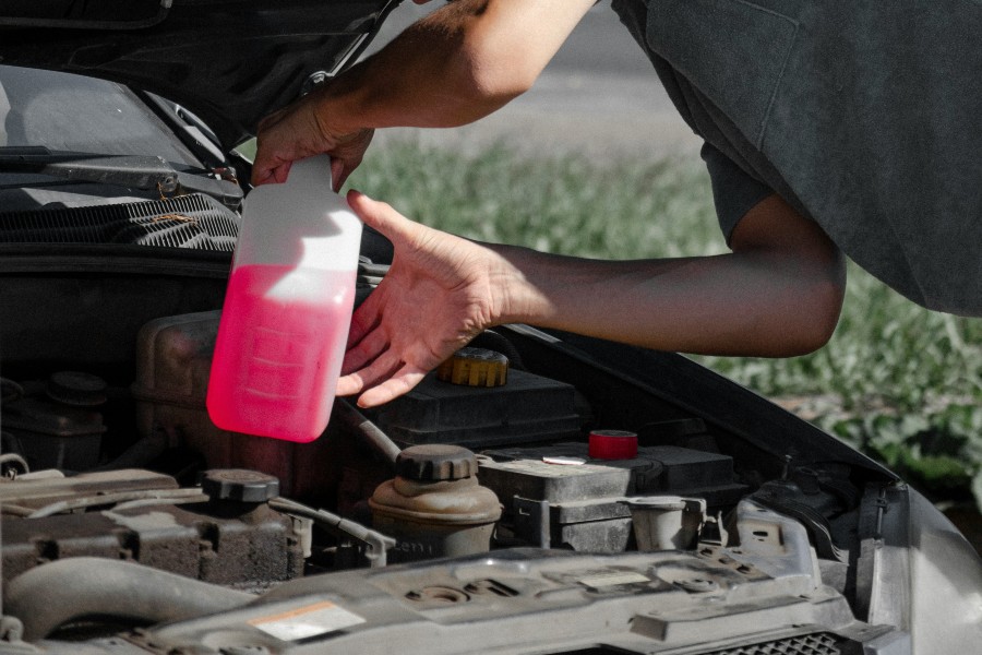 Topping Off Coolant or Antifreeze in Vehicle's Engine Bay