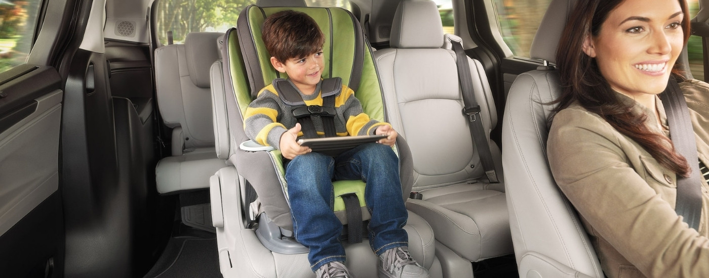 Child using a tablet in a 2020 Honda Odyssey