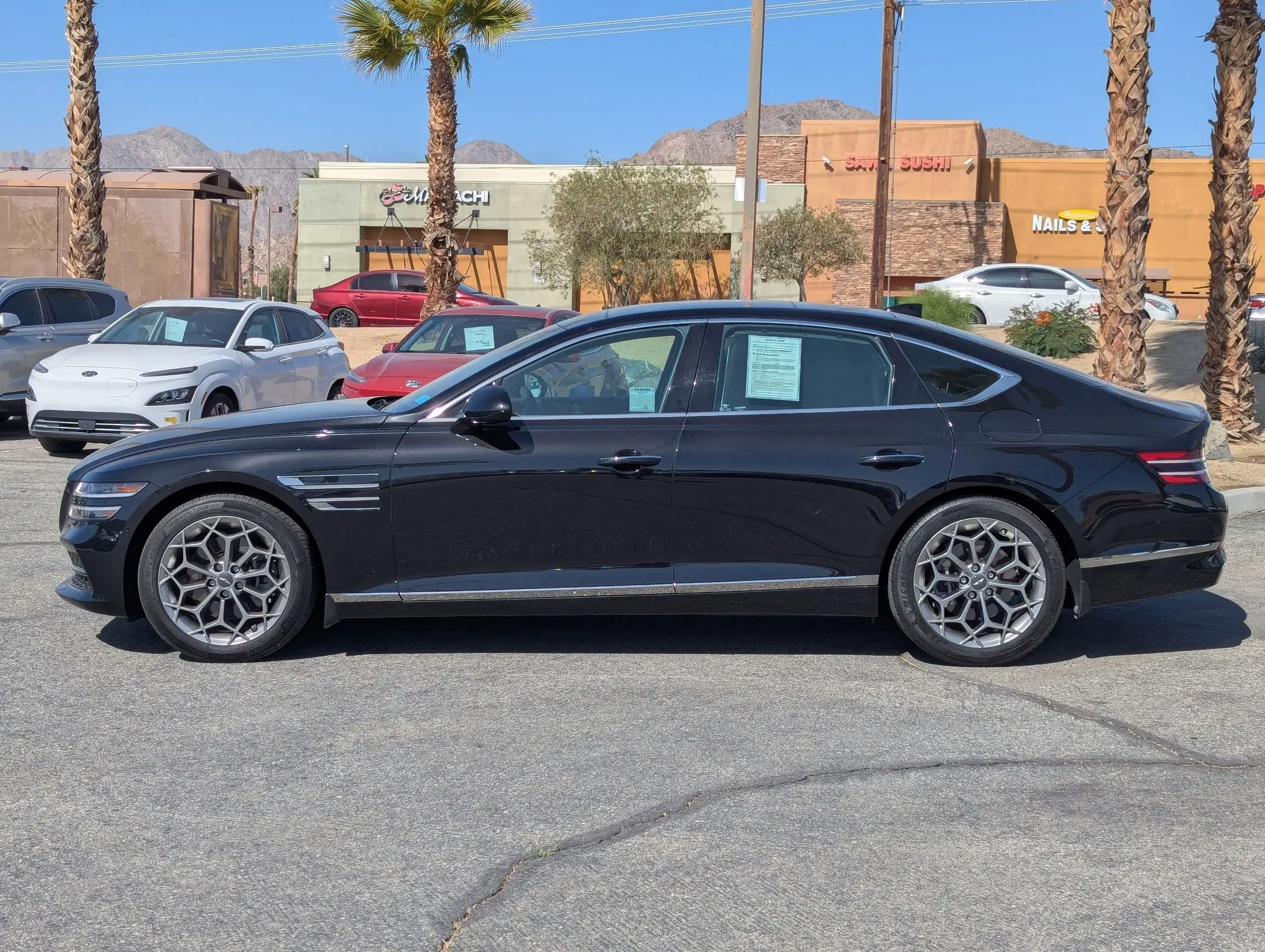 Used 2022 GENESIS G80 Base with VIN KMTGB4SC4NU129884 for sale in La Quinta, CA