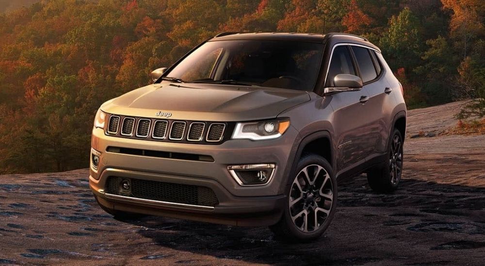 Silver 2021 Jeep Compass parked off-road