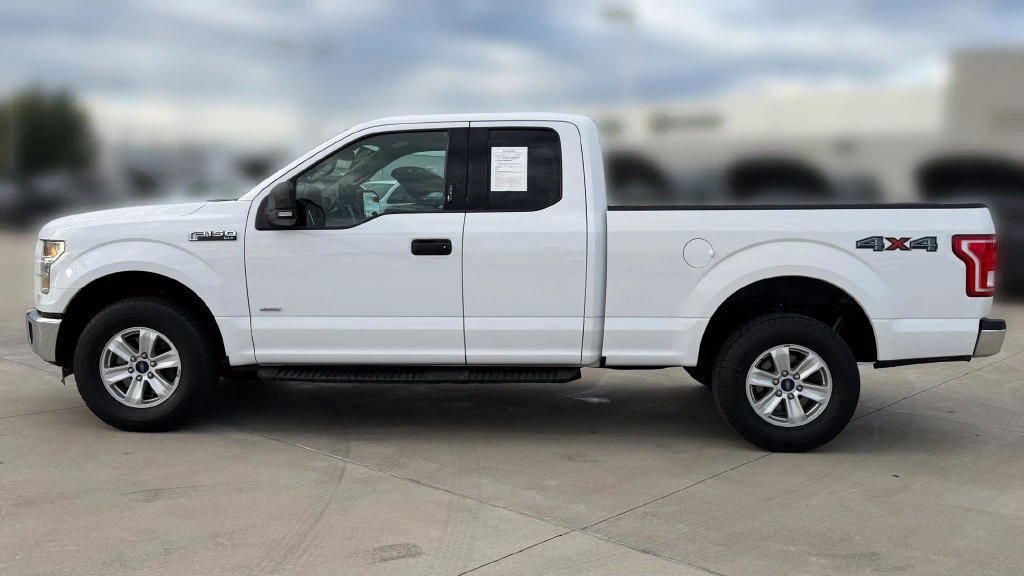 Used 2015 Ford F-150 XLT with VIN 1FTEX1EP8FKE86258 for sale in Kansas City