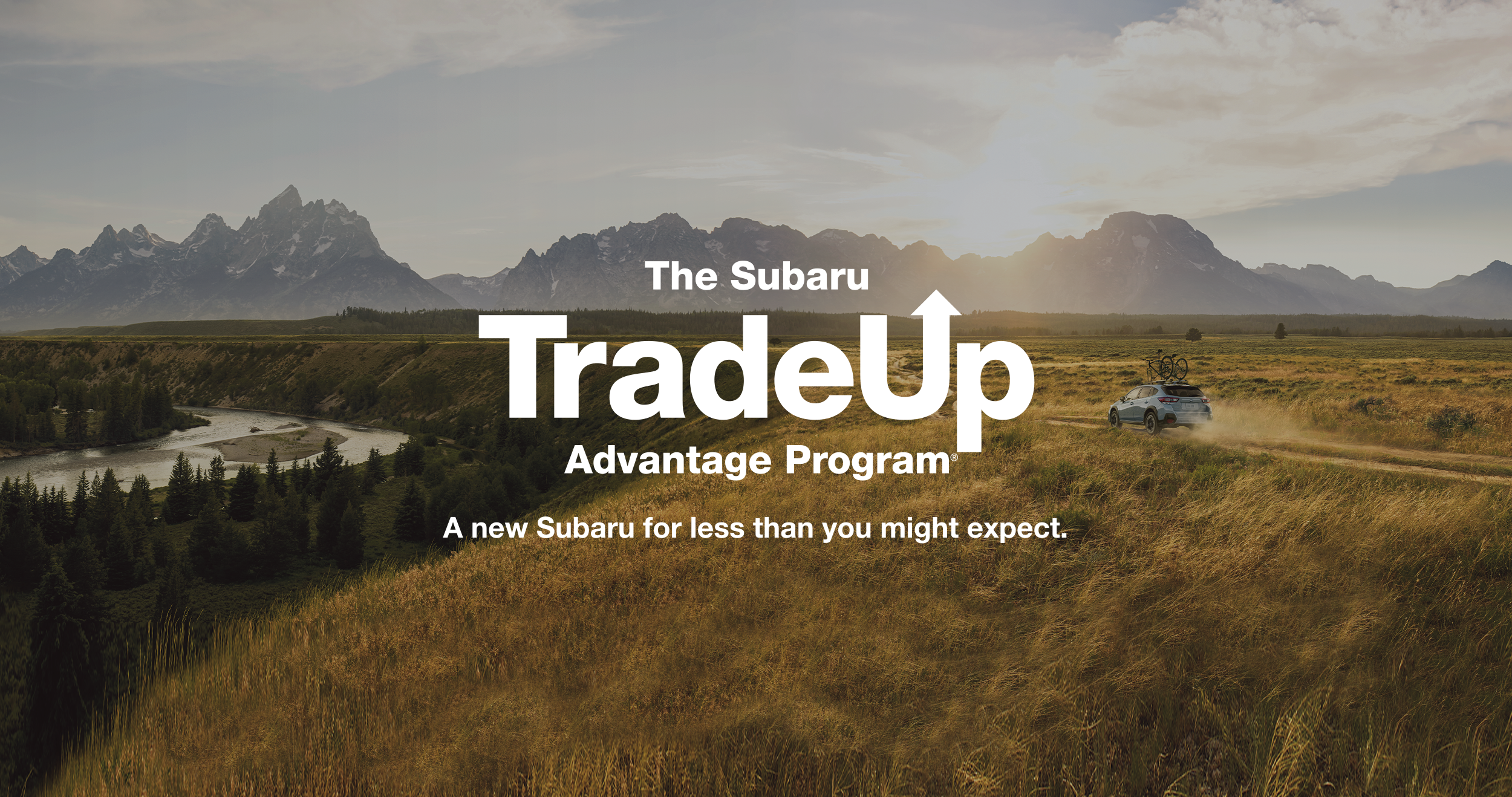 A blue 2023 Subaru Crosstrek in blue with the sentence "The Subaru TradeUp Advantage Program".