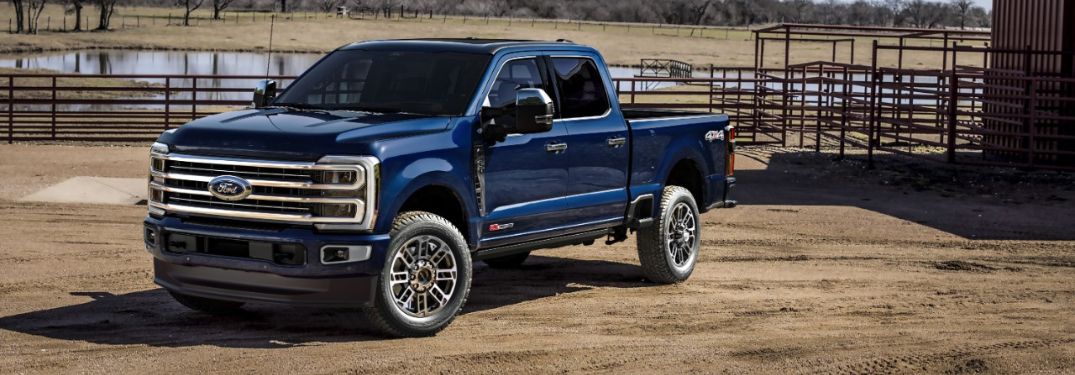 Blue 2025 Ford Super Duty Platinum with Platinum Plus Package on Horse Farm