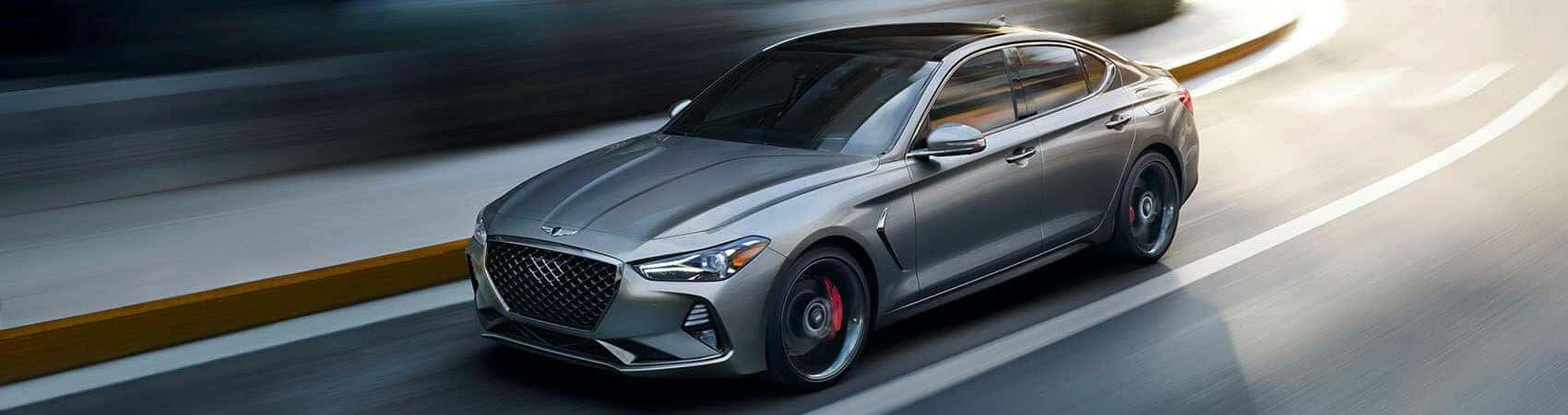 Genesis GV70 driving in Denver