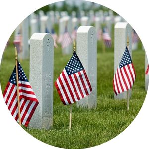 Lines of Gravestones with Small American Flags at Each One