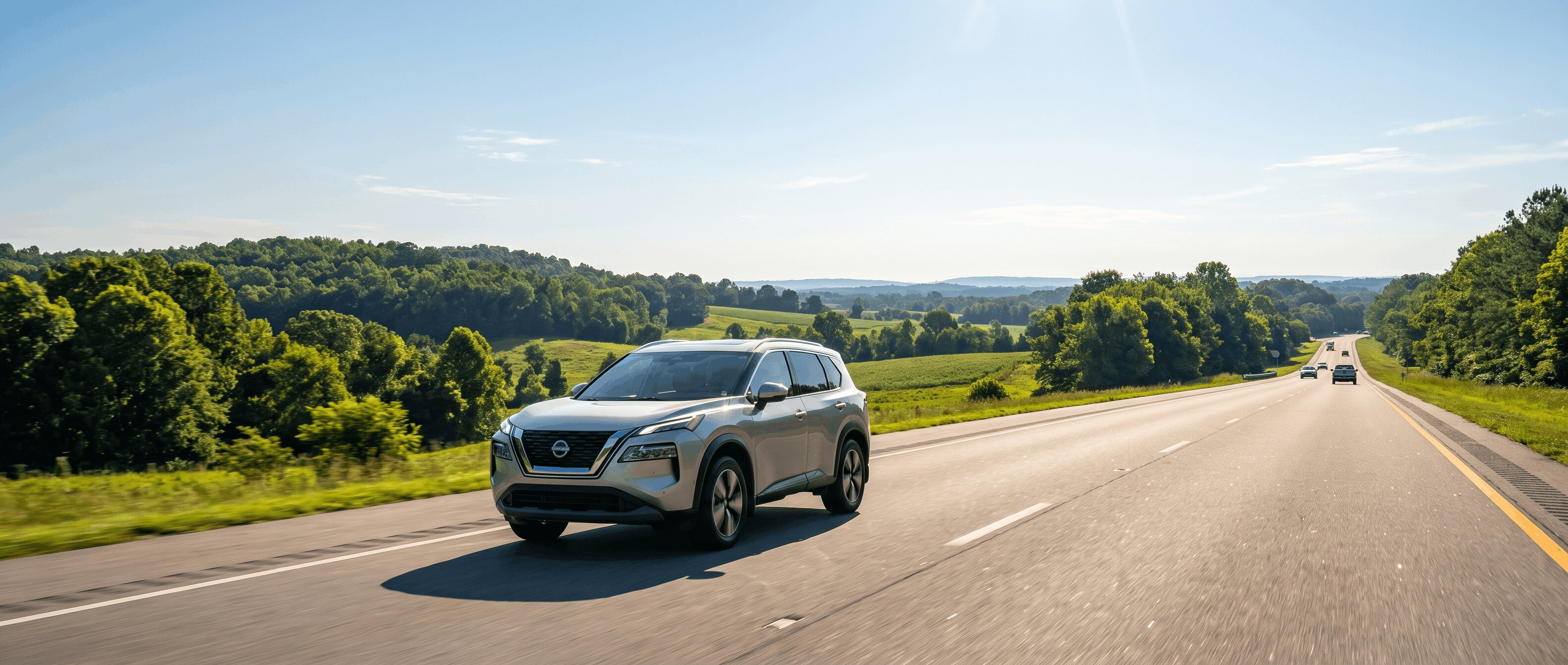 2026 Nissan Rogue on I-85 heading from Roswell GA toward Greenville SC on a summer road trip