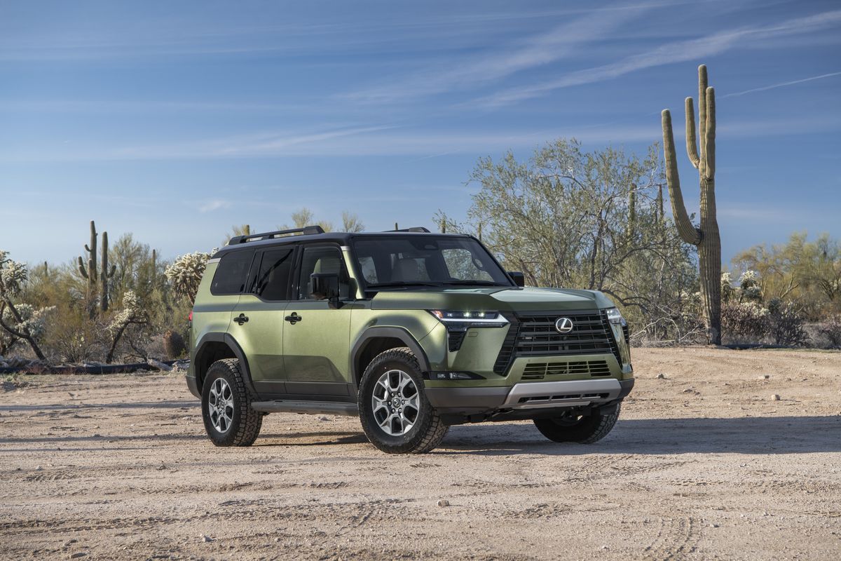 2026 Lexus GX 550 Overtrail in green parked on dirt with visible lift and all-terrain tires