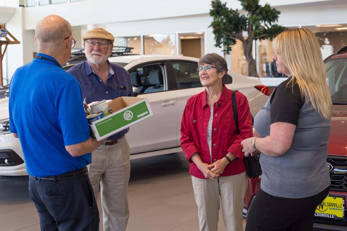 Wilsonville Subaru staff presenting a donation to St. Vincent de Paul