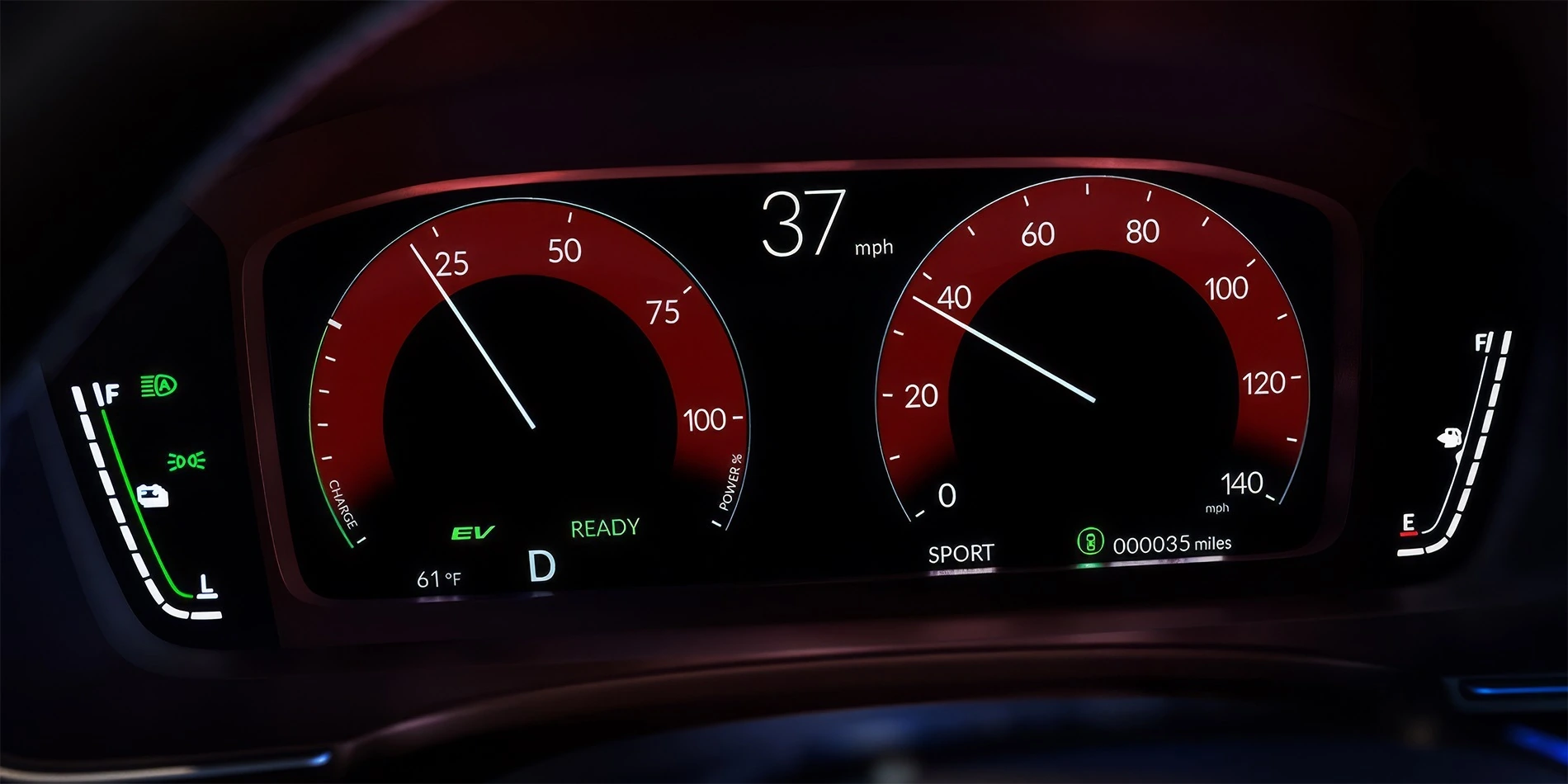 Close-up view of a 2026 Honda Civic digital instrument cluster showing the illuminated speedometer, EV-ready display, fuel gauge, and modern red-accented dashboard graphics inside the driver cockpit.
