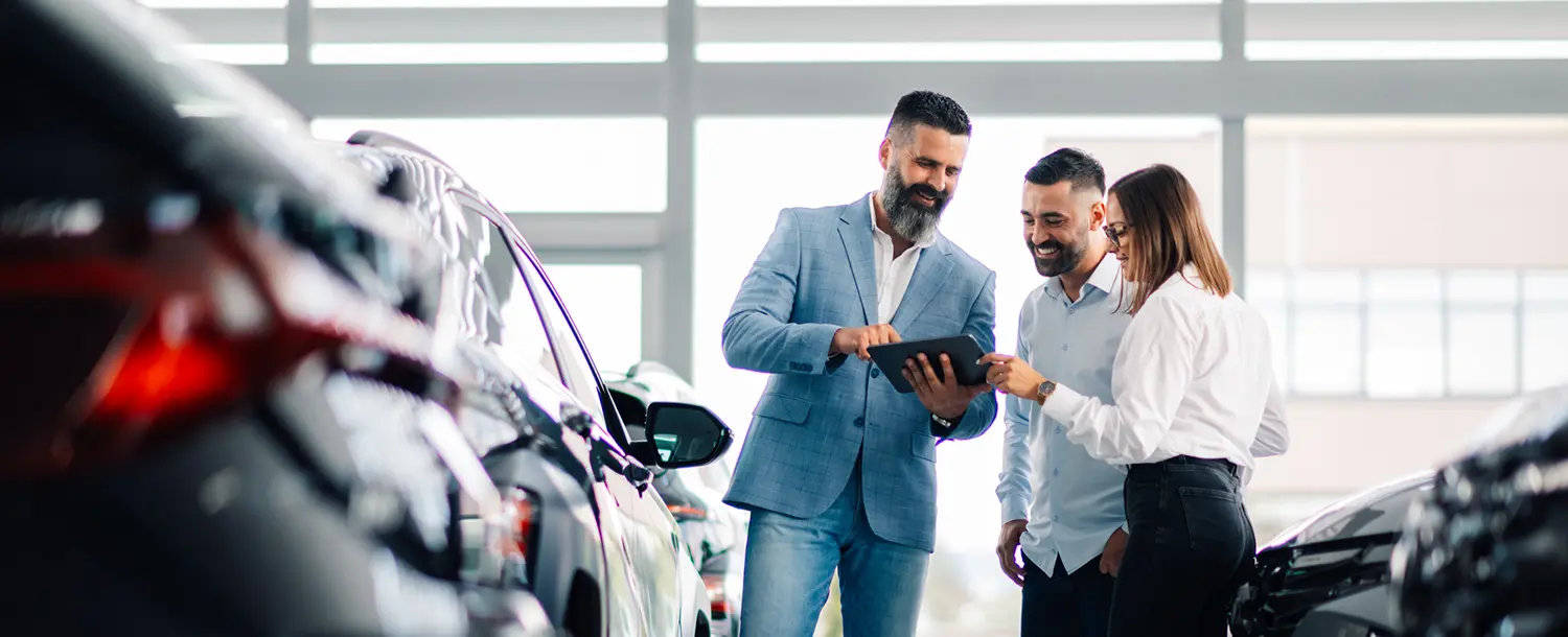 Salesperson and customer on tablet