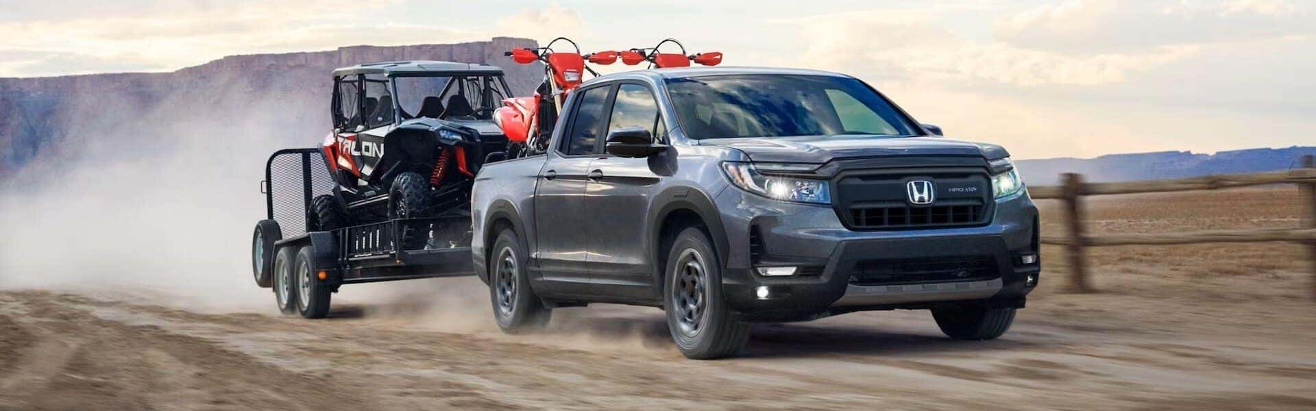 2024 Honda Ridgeline TrailSport Towing A Small Vehicle