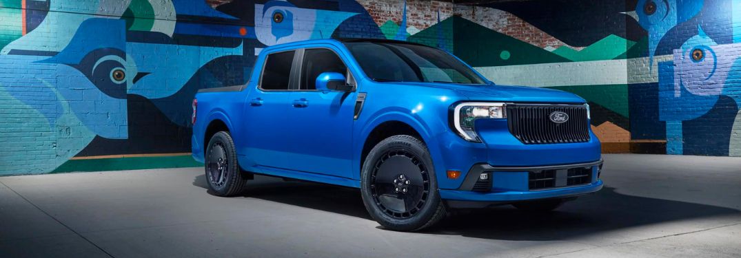 Blue 2025 Ford Maverick Lobo Front Exterior Next to Street Mural